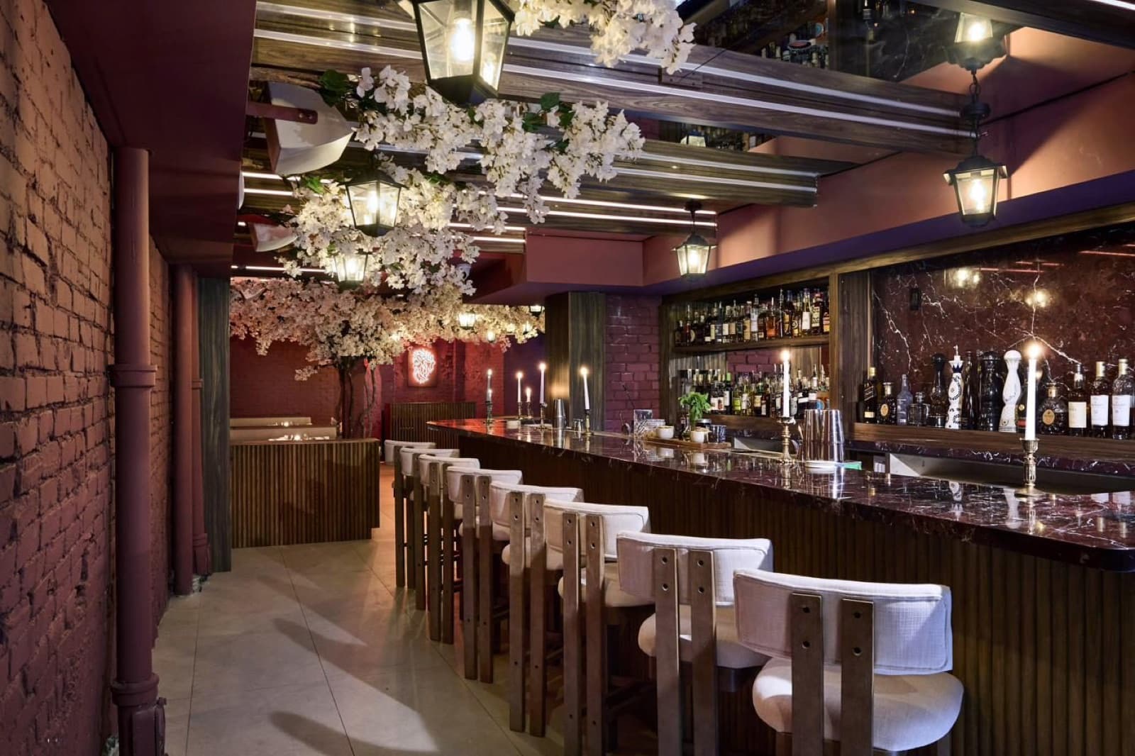 The bar in Taverna, Paros's late-night room, under a canopy of white blossoms