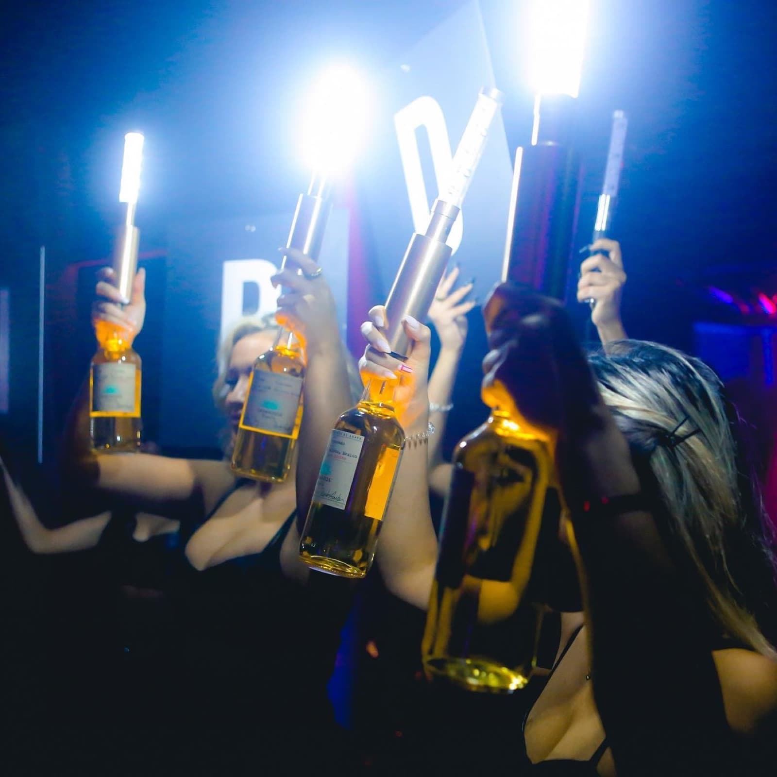 Bottle service at Ultraviolet, bottles raised with LED toppers
